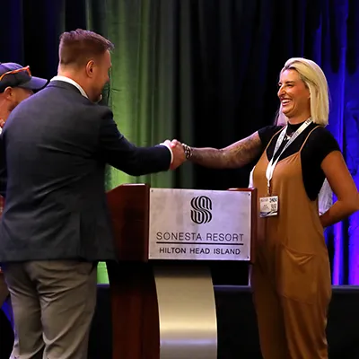 Woman on stage at an ABA conference
