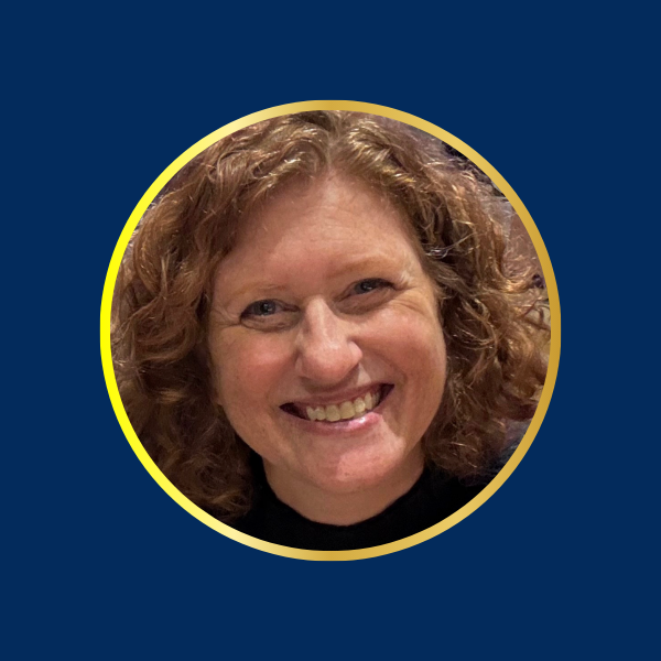 Two people shaking hands on stage at an ABA Cares conference